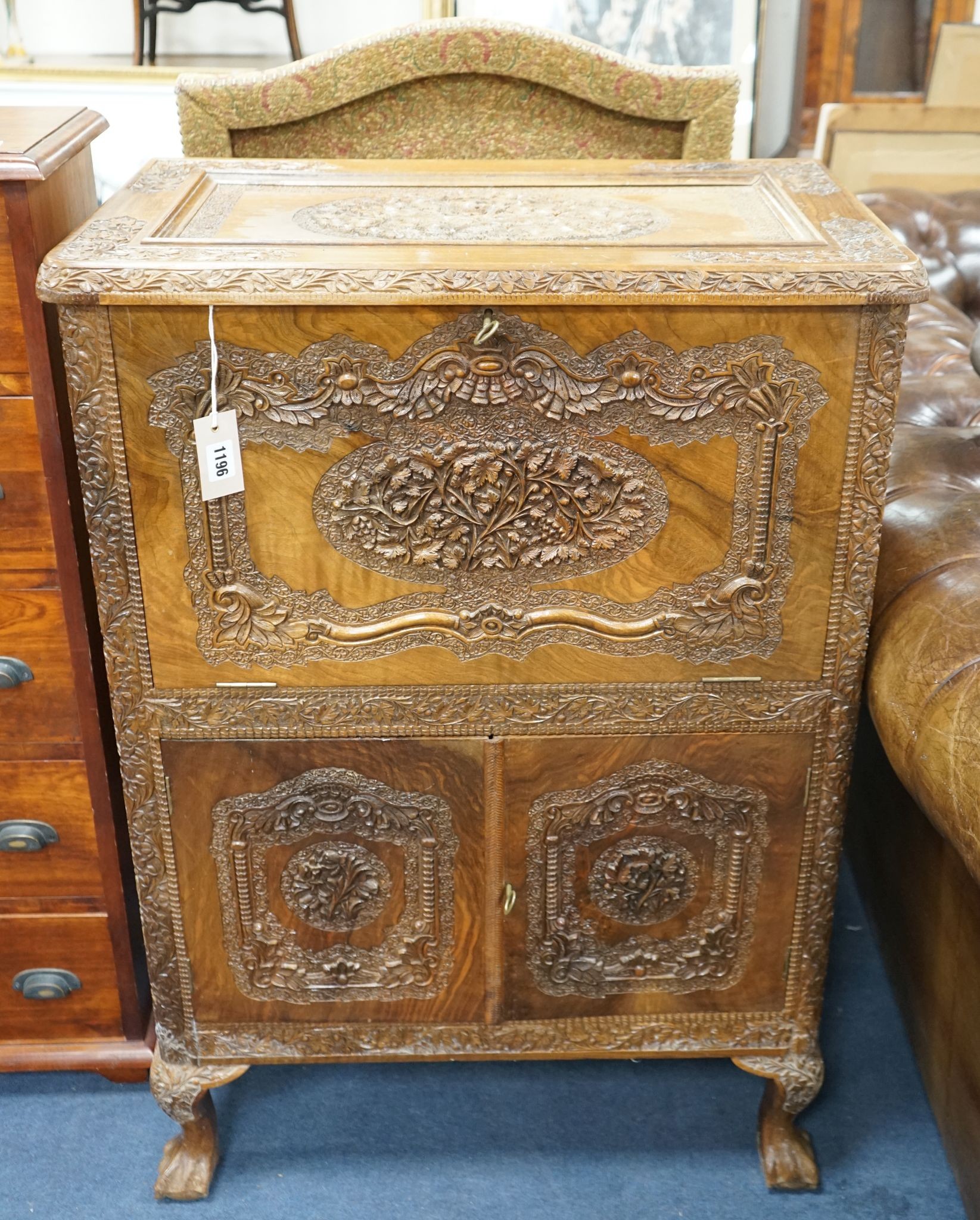 A Kashmiri carved hardwood cocktail cabinet, width 67cm, depth 42cm, height 96cm